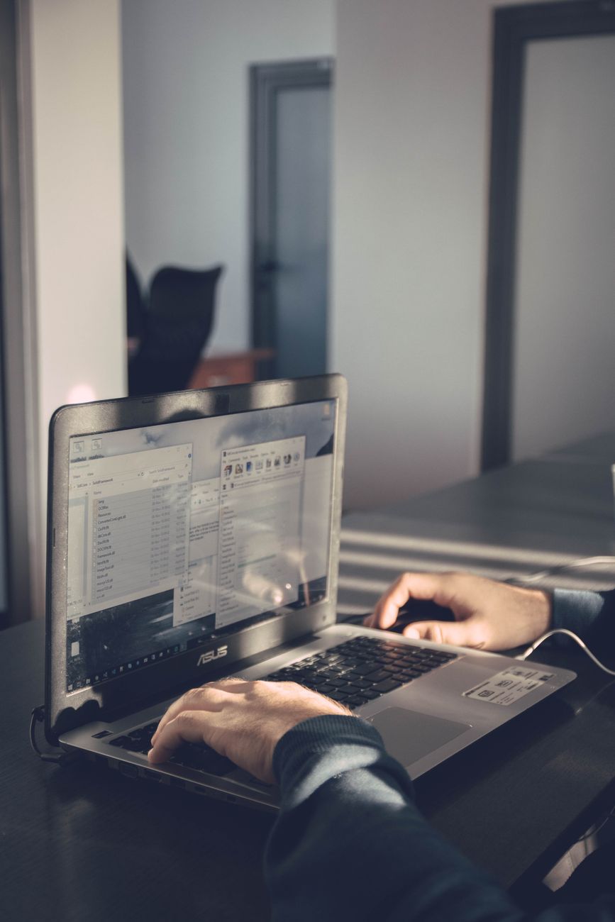 Journalist Working at Local Desk Setup